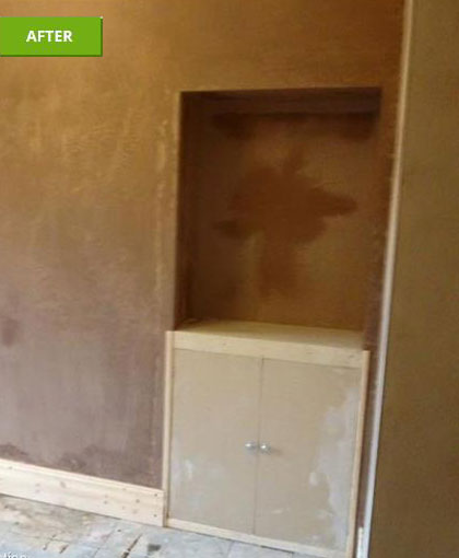 Living room re-plaster - Finished plastering, starting to dry out, alcove cupboard built